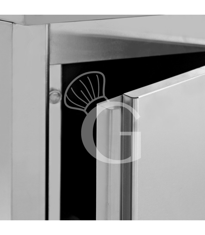 Tavolo armadiato a angolo in acciaio inox con porta battente e profondità 700 mm