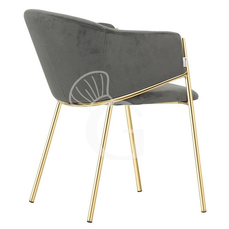 Poltroncina con struttura in metallo ottonato e rivestimento in tessuto o velluto