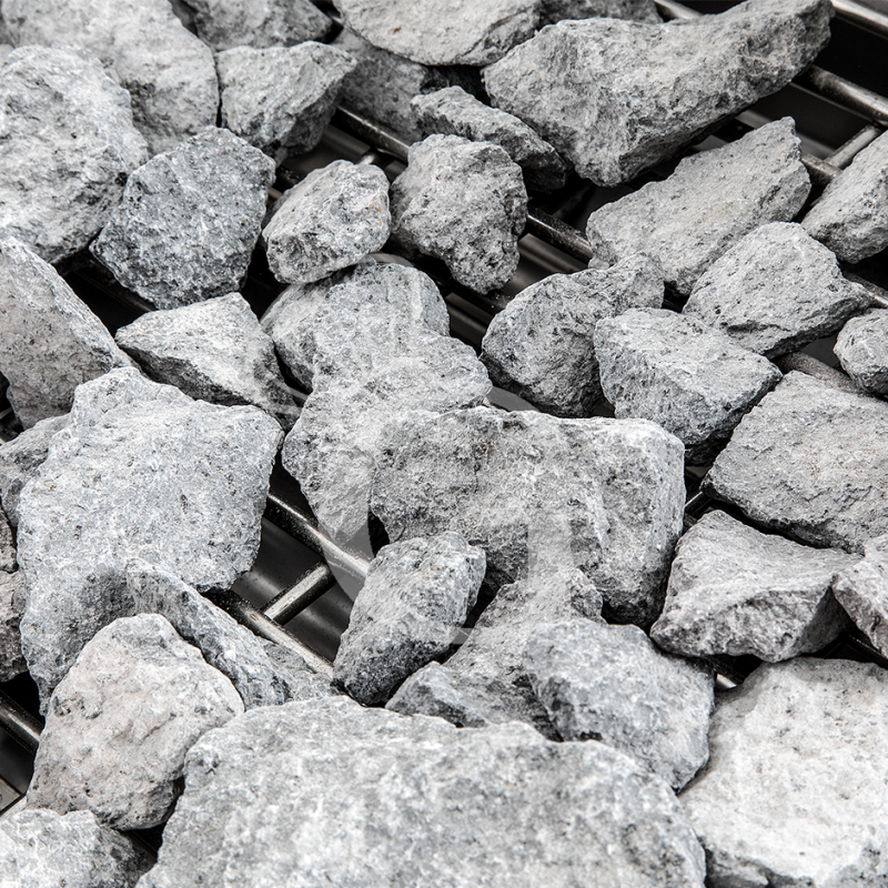 Griglia a gas e pietra lavica su armadio aperto con 1 zona di cottura e profondità 900 mm